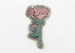 El bordado de la flor del modelo de Rose remienda el material brillante 100% del poliéster del color proveedor